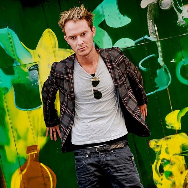 portrait ion male model graffiti wall by portrait photographer in Glasgow, Scotland