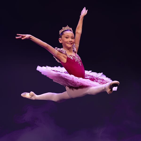 dance show photography: young ballet dancer in split leap