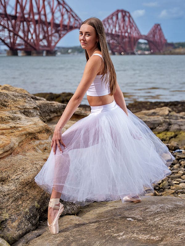 dancer-poses-white-costume-forthrailbridge